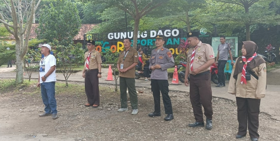 PRAMUKA MANLIBO BANTU PAM LALIN DAN WISATA